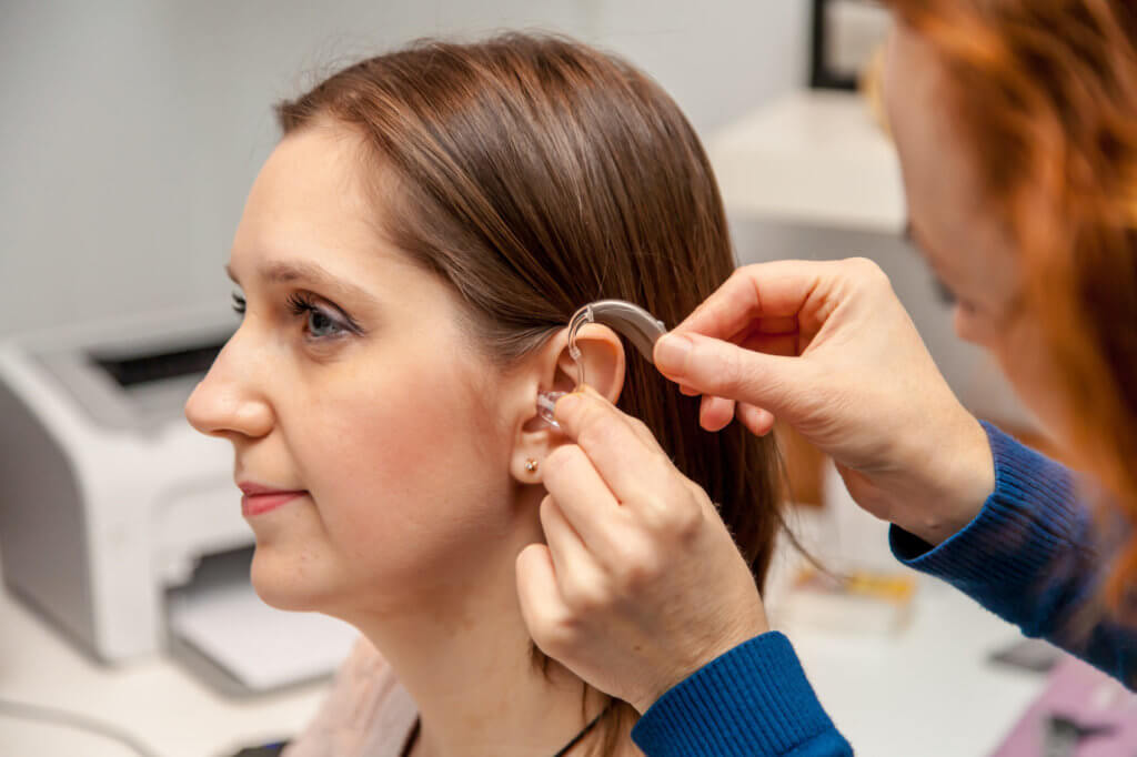 Audiologist conducting hearing test before hearing aid fitting Jayanagar